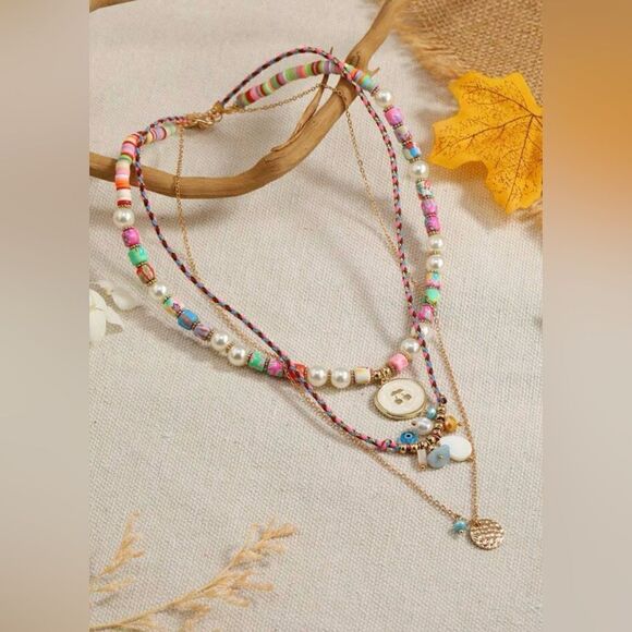 Anthropologie Jewelry - Anthropologie Multicolor Layered Beaded & Gold Charm Necklace